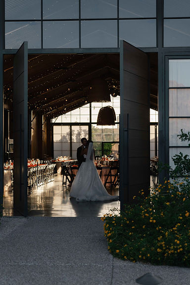 Bride & groom share a private moment after exiting ceremony.
