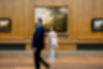 Engagement photo of a couple inside the National Gallery of Art in Washington, DC