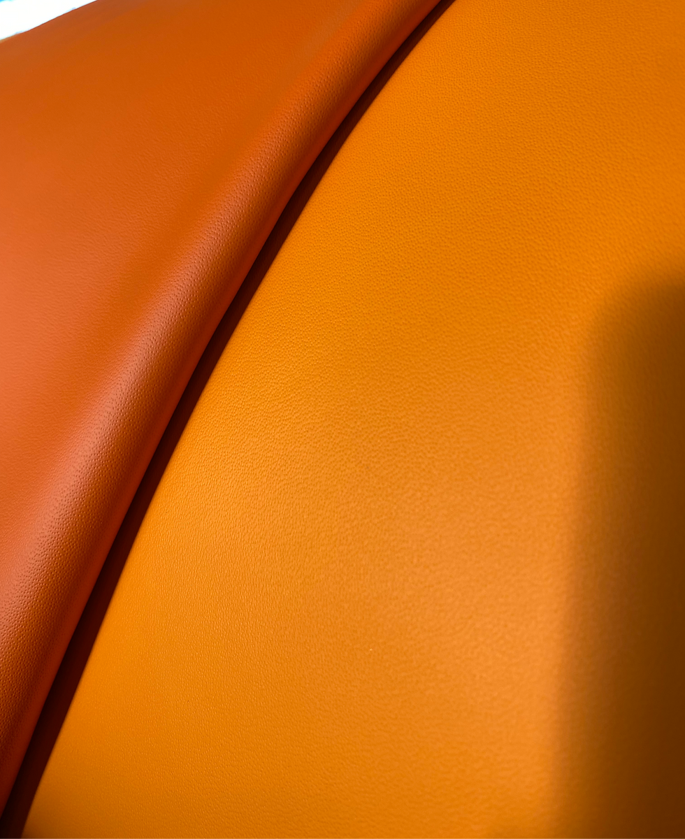 The orange leather created by Tirrena Leather Processing, a tannery based in Lonigo (VI)