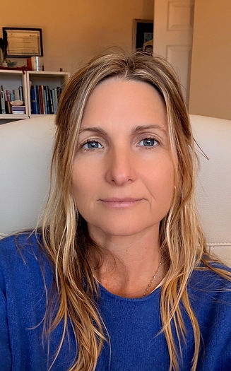 Natasha Martin sitting in her counselling room in Devon