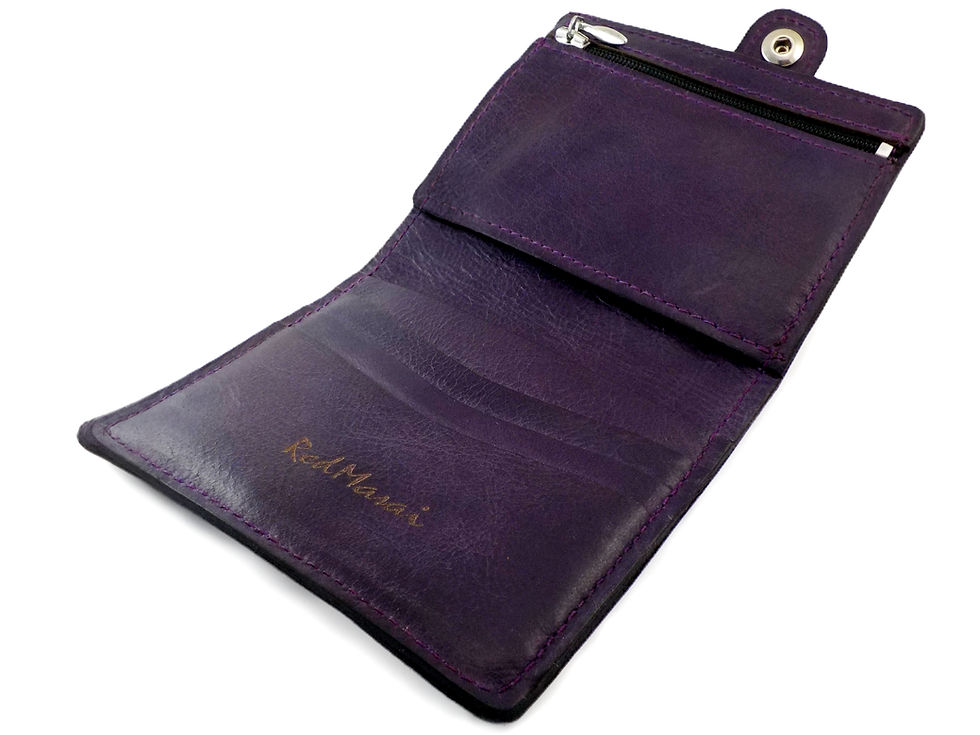 cartera de cuero Eguzkilore en tono morado abietra