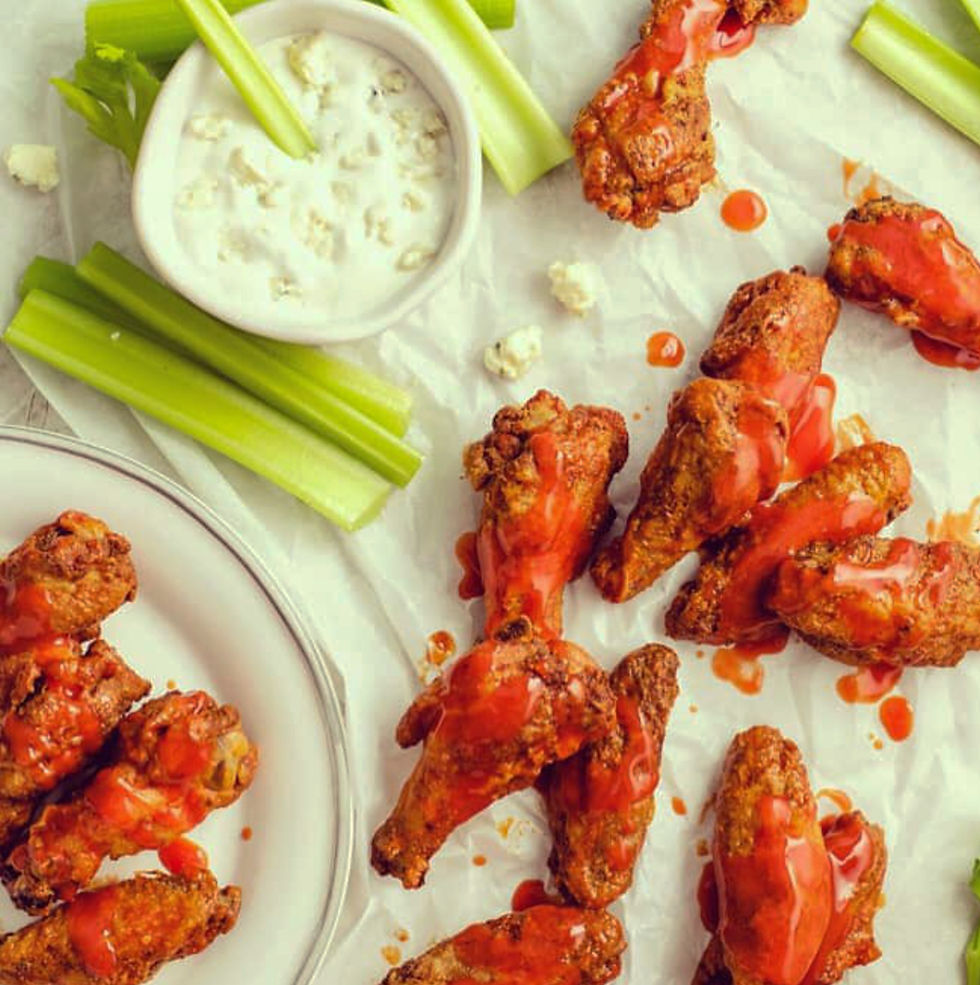 Crispy buffalo chicken wings appetizer at Fetch Bar and Grill