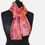 Thumbnail: 'Coral Beach' Hand Dyed Silk Scarf on mannequin