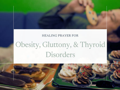 junk food in foreground with person in background laying on a couch eating a cookie