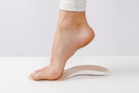 Medical insoles. Isolated orthopedic insoles on a white background. Foot care. Insole cuta
