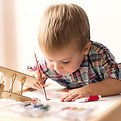 Child Painting Model Airplane