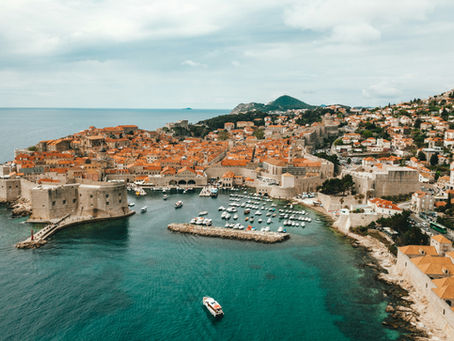 view of city with city wall marina and building