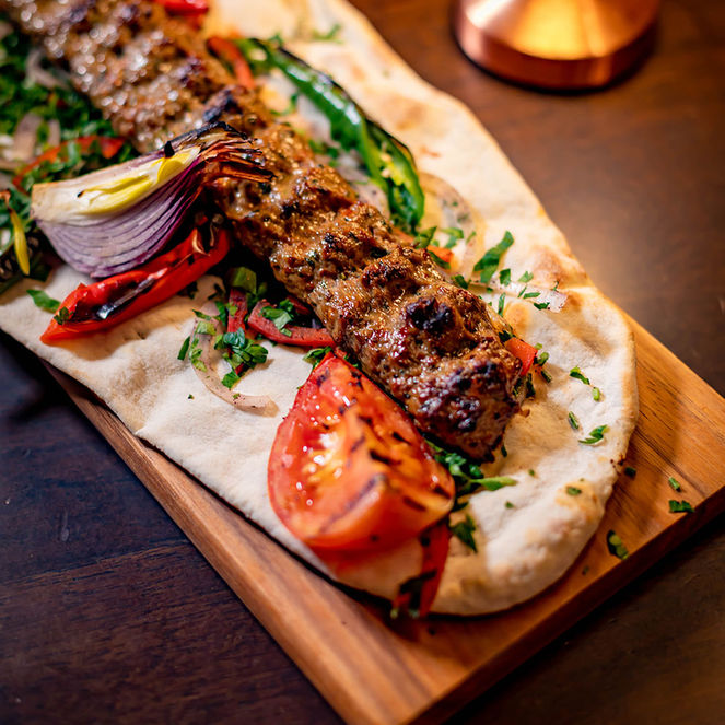 Kebab Grill on Bread at Bushra By Buddha Bar