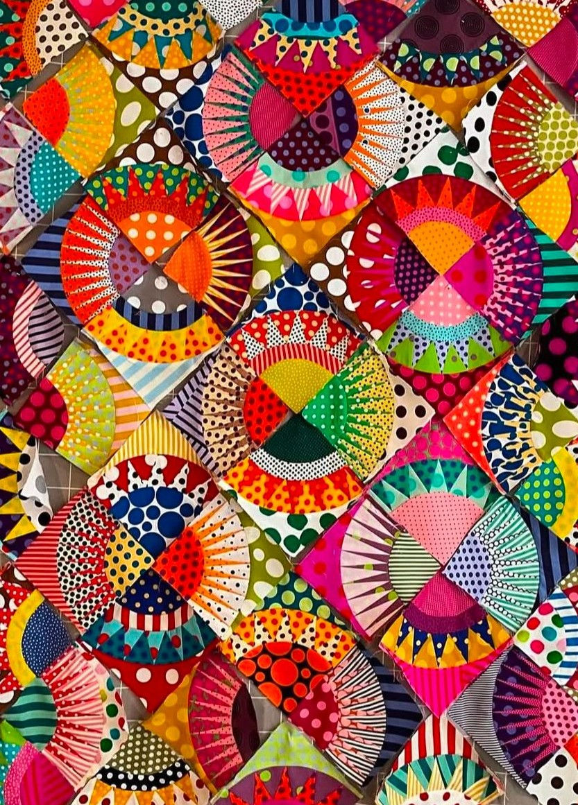 Eye-level view of a vibrant mural painting session in a community space