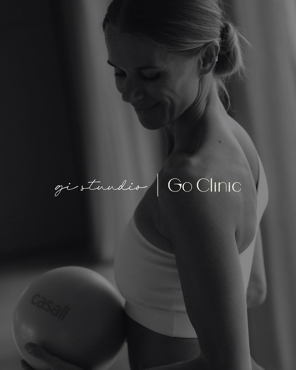 yoga teacher hold a pilates ball at Gi stuudio