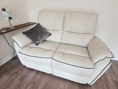 Two ivory leather sofas in great condition for £200