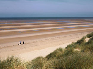 Good morning on Saturday 9th July. High pressure means it's warming up this weekend in Formby