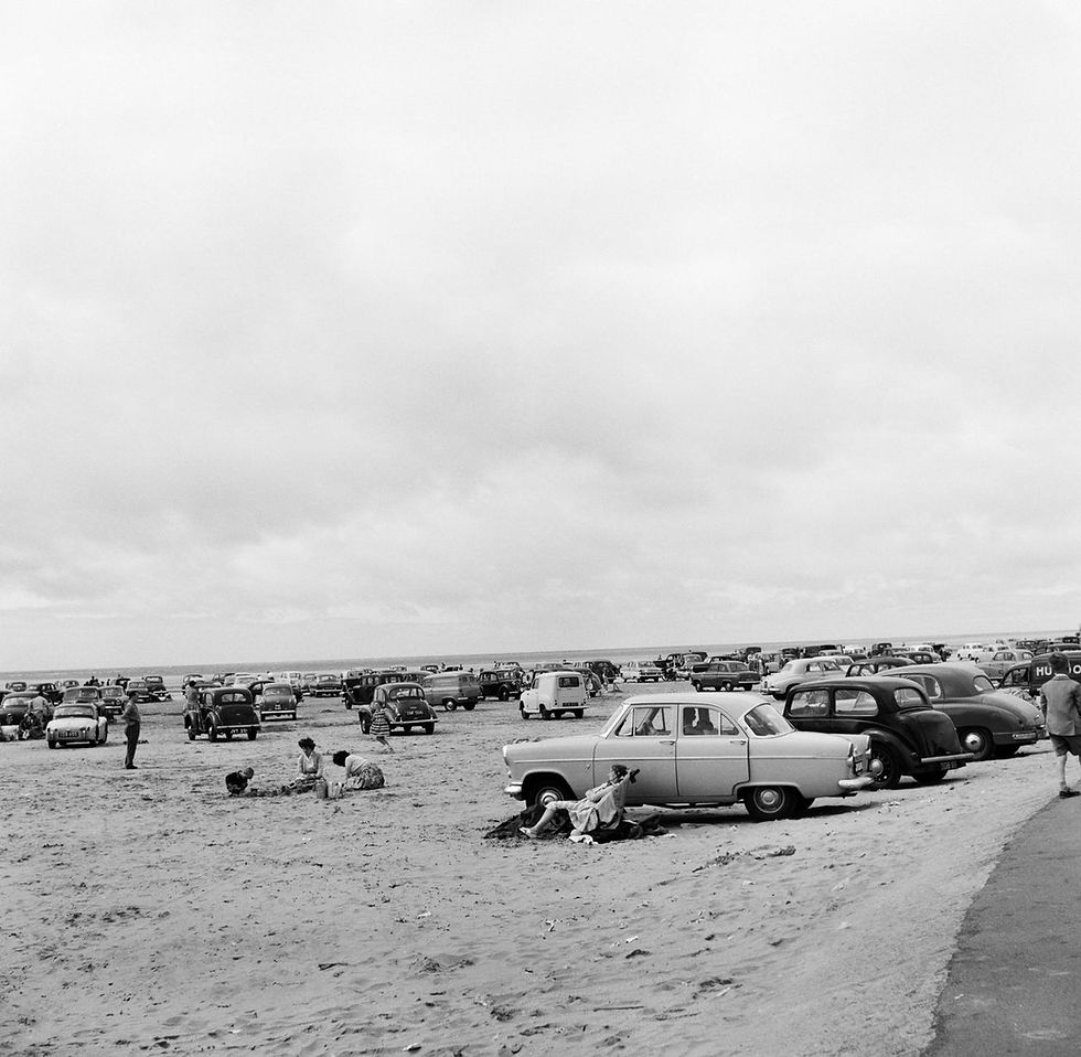 Holidaymakers and their cars on Southport Beach on 5th August 1959.jpg