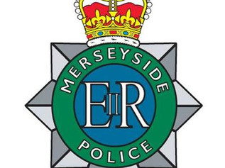 Merseyside police carry out search of land next to Leeds-Liverpool canal