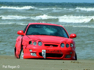 Two cars wrecked on Formby beach