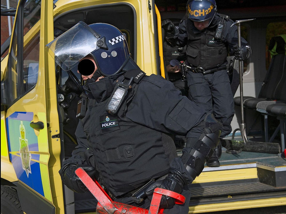 Police carried out raids in Southport, Bootle and Liverpool this morning...jpg