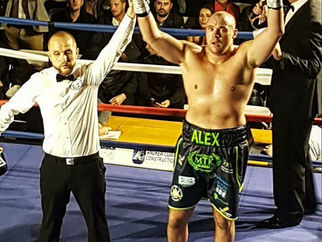 Formby’s boxer Alex Dickinson extends his unbeaten record to 7-0 last night in Liverpool