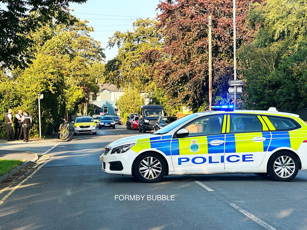 Police block off roads at the scene of RTC at the same junction where a ...