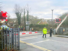 Police have cordoned off the Ravenmeols Level Crossing due to a bus hitting the barriers