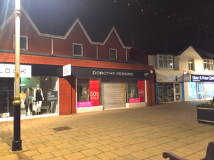 Yobs in Formby throw slates from shop roof onto cars in the village