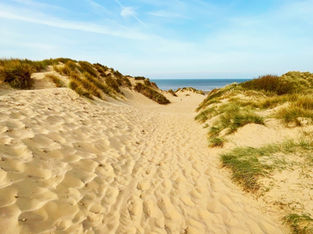 Good morning on Tuesday 19th April. A dry start but showers developing and feeling cooler in Formby