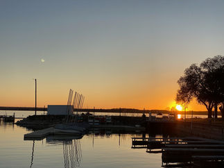 dinghy harbor sunset