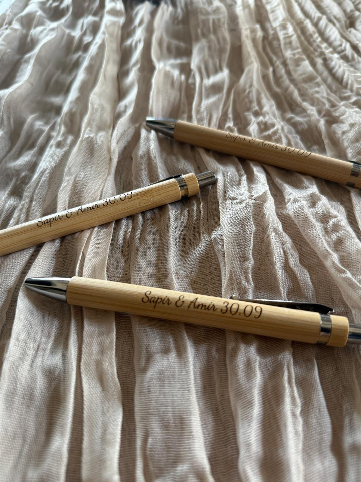 50 עטים ממותגים דמוי עץ