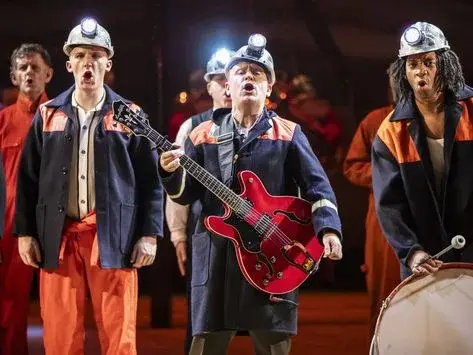 Centre actor John Holt Roberts as Jack pictured with members of the cast of Welfare Derby Theatre (2024)