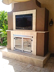 Outdoor fireplace and media wall.