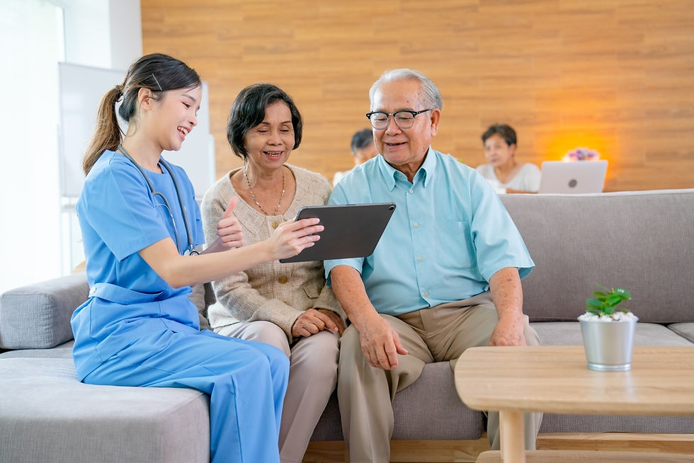 Senior couple checking in at Medical Center for Medicare check-up