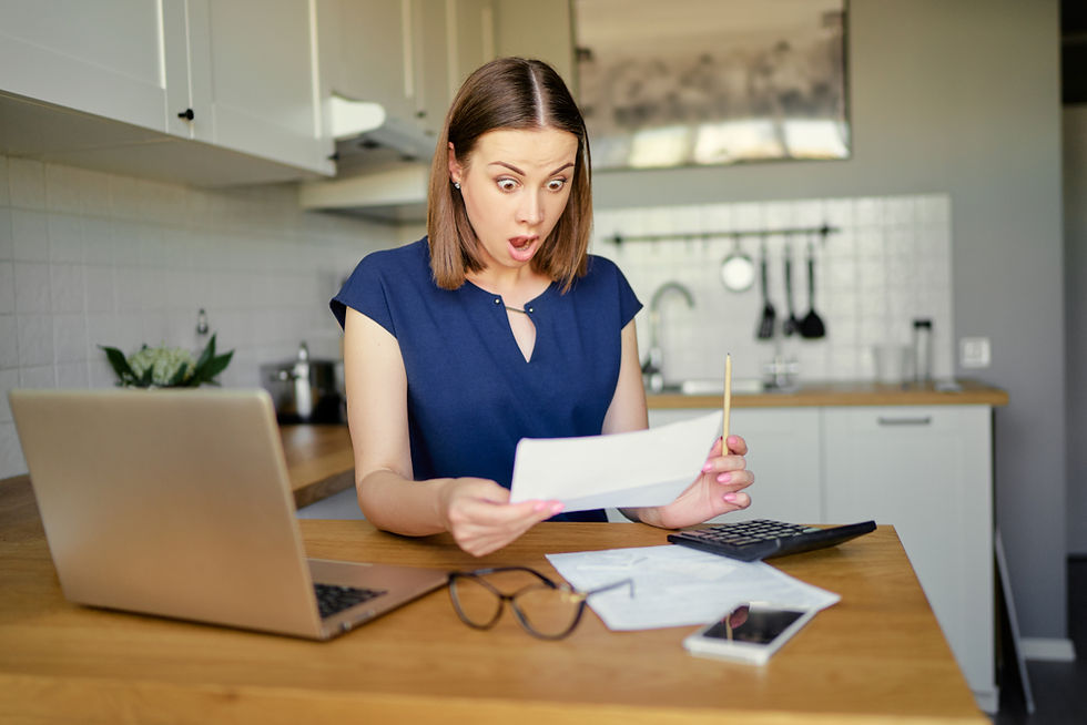 A woman is surprised with her monthly expenses - she needs a system to help her - The Debt Action Plan
