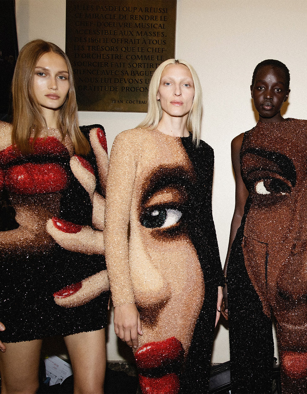 In Spring/Summer 2025, Balmain turns these fragments into shine, beadwork and surface. The face becomes almost object-like, built rather than simply printed.