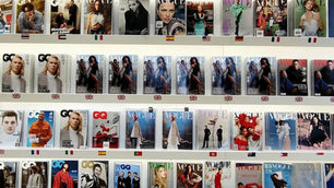International editions of GQ and Vogue displayed at Condé Nast Worldwide News in London.