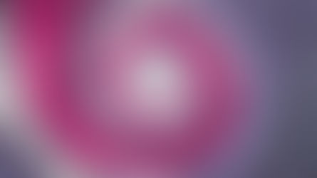 An animated spiral staircase wrapped in a large pink ribbon, with a couple embracing near the centre.