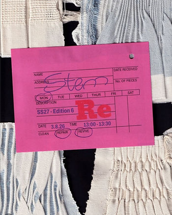 A bright pink Stem tag marked SS27 Edition 6 is pinned to a pale woven textile, with “repair” and “revive” circled at the bottom.