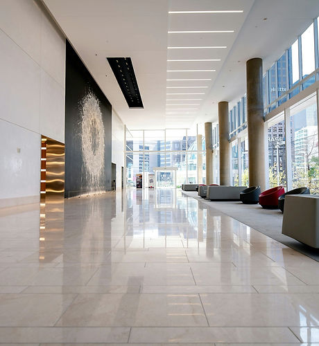Bright building corridor with polished floors