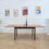 Thumbnail: Table à manger extensible en teck dans une salle à manger