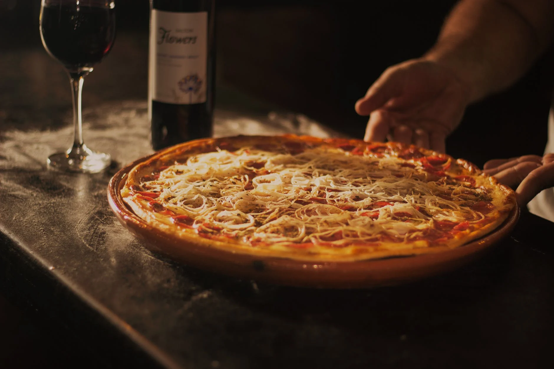 Pizza with A Bottle and Glass Of Wine Photo by Edward Eyer