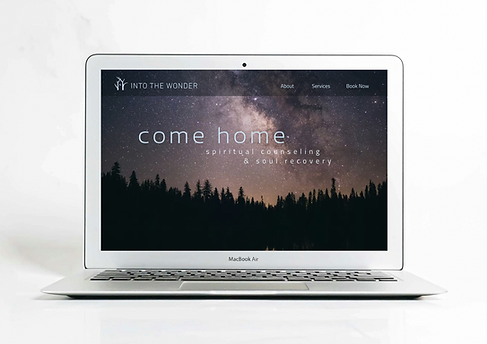 Chris homepage on laptop.png