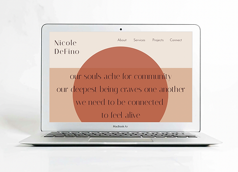 Nicole homepage on laptop 2.png