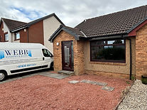 Bungalow with gravel and Webb van
