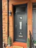Modern composite door on red sandstone building in Kilmarnock
