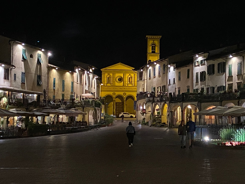 Greve's piazza is simple yet elegant and surrounded on all sides by small, welcoming businesses. During the day it is a natural place for outdoor markets, children at play, and friends to meet and catch up over coffee.