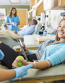 Example of blood donation and safe clinical practice in a healthcare setting.