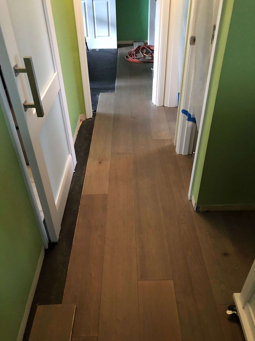 Hardwood flooring install in progress