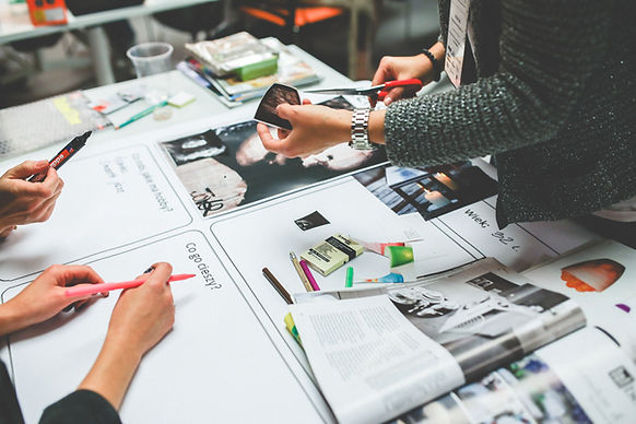 designer hands developing a web design chart flow