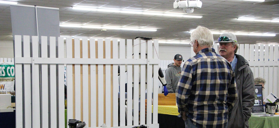 visitors looking at drone