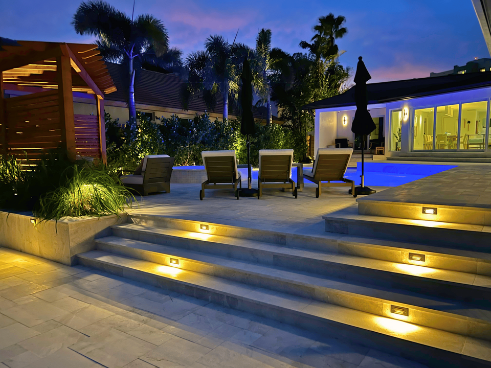 Travertine steps with landscape lighting