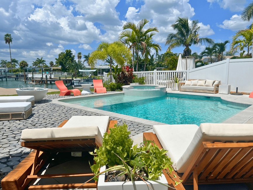 Leslie Davis and Lyndsay Lamb's Swimming Pool Featuring A Sunshelf, Spillover Spa, & Cobble Stone Decking From Season 5 of Rock The Block