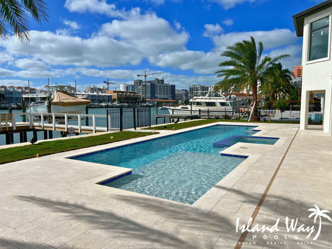 Geometric Waterfront Pool With A Flush Spa And Sunshelf In Clearwater Beach
